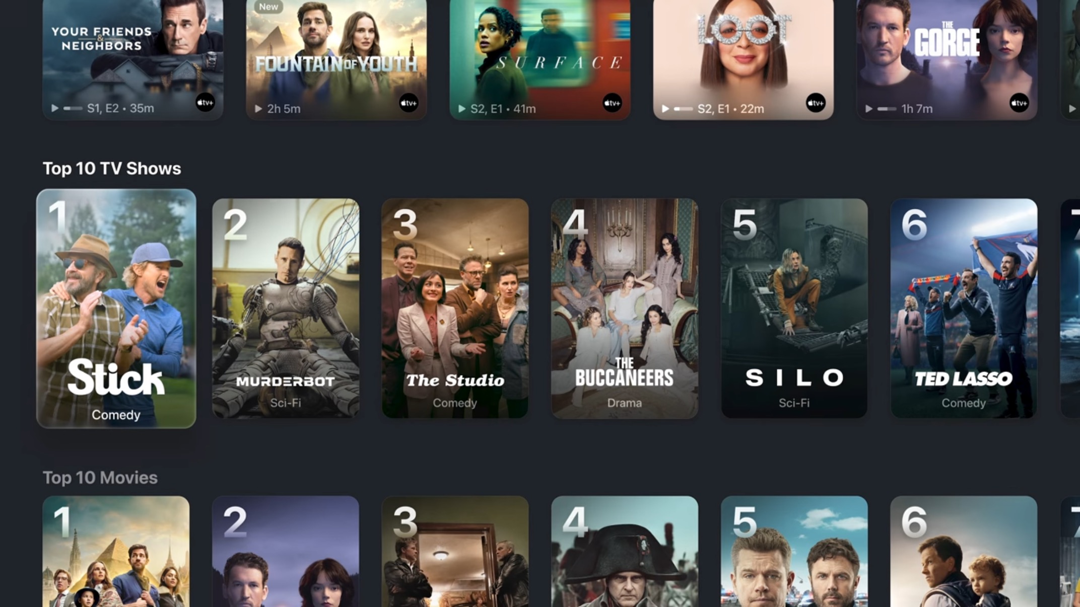 A screenshot of the Apple TV's TV app interface showing rows of movie posters with only the middle row completely readable. Text for the show and movie is overlaid on the poster element instead of below it like it was previously with the 16:9 aspect tiles.