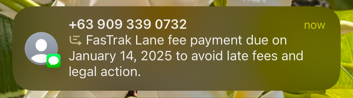 iOS text message spam. Summarization glyph. FasTrak Lane fee payment due on January 14, 2025 to avoid late fees and legal action.