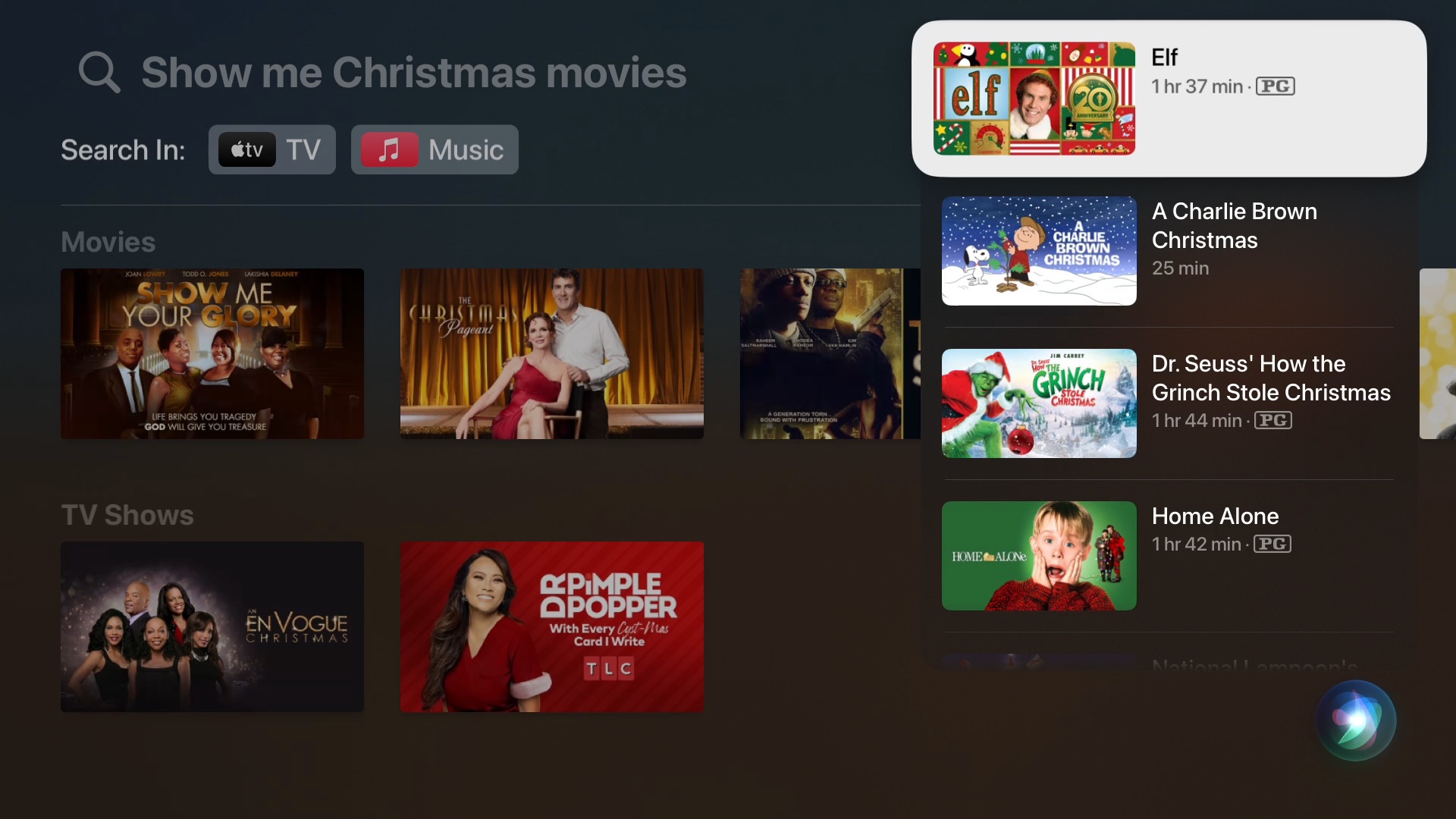 A screenshot of the tvOS Search app with the search results for 'Show me Christmas movies' and the Siri overlay for 'Show me Christmas movies'